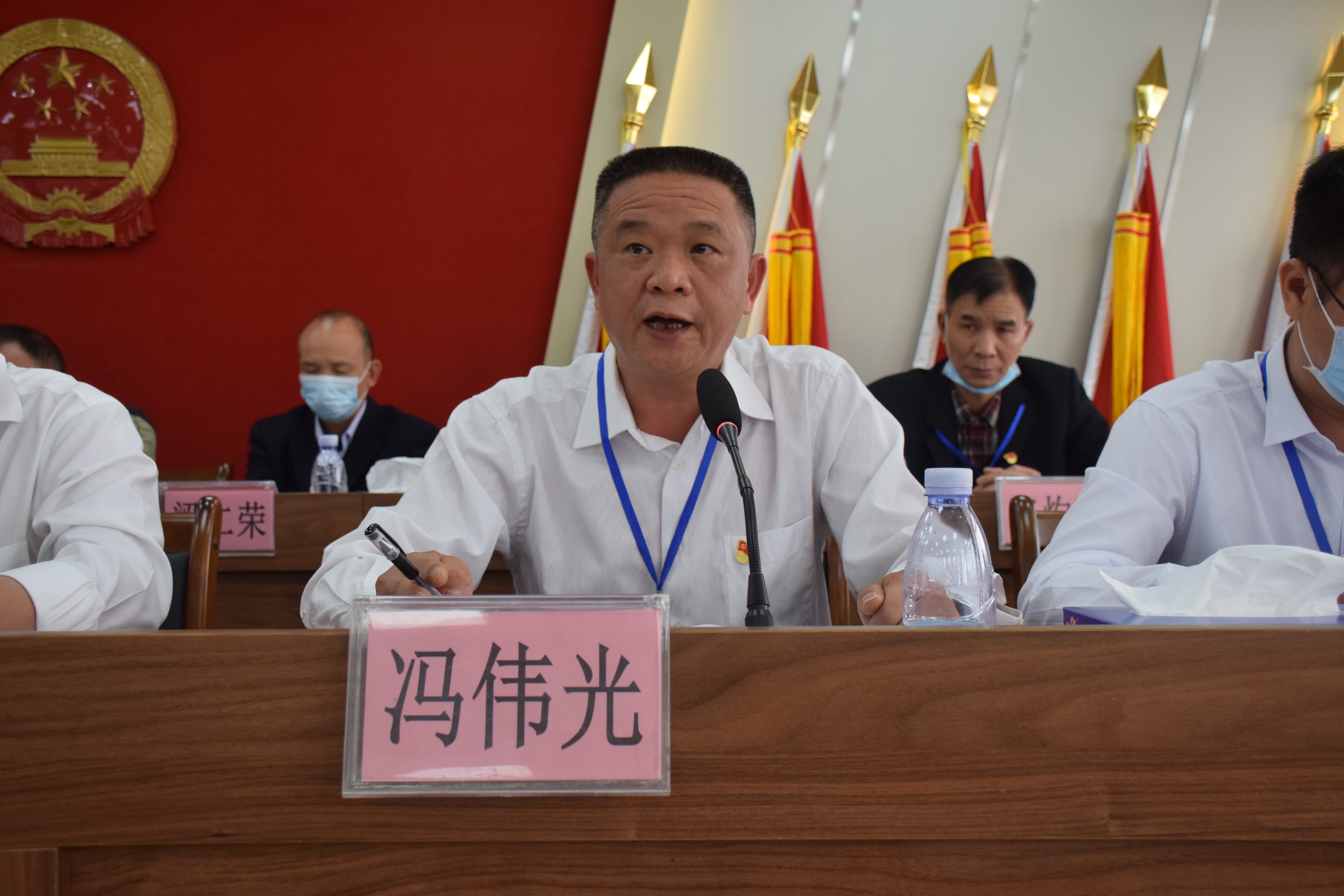 3龙胜镇人大主席冯伟光作《2020年龙胜镇人大主席团工作报告》.JPG